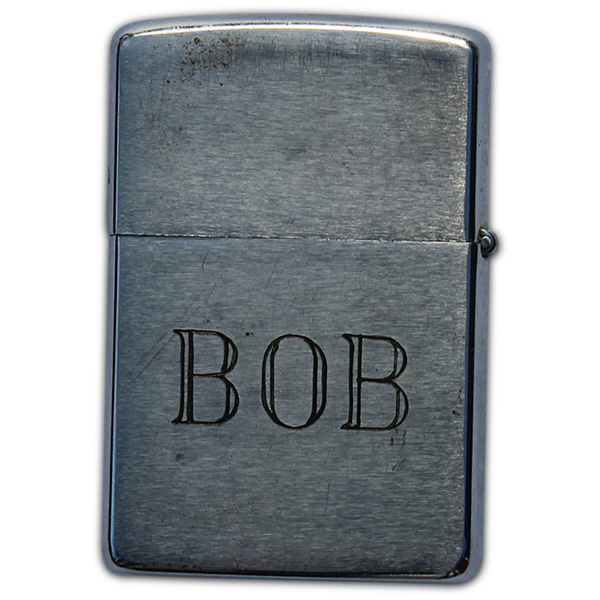 Robert Mohs' engraved Zippo lighter. (5)